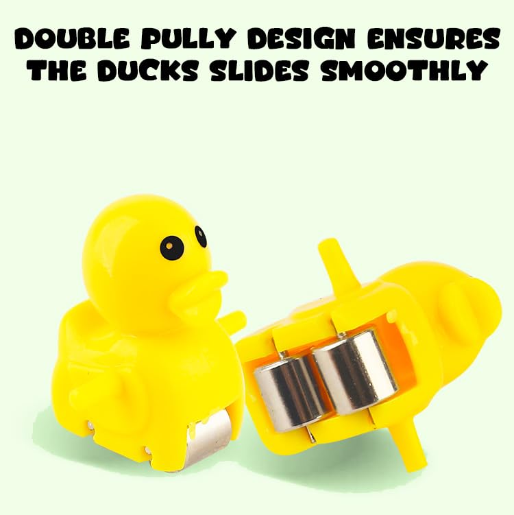 Yellow rubber duck with a double pulley system on a white background